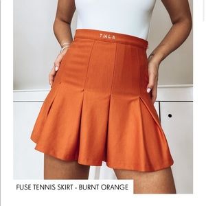 2 TALA Fuse Tennis Skirts:Burnt Orange & in Black